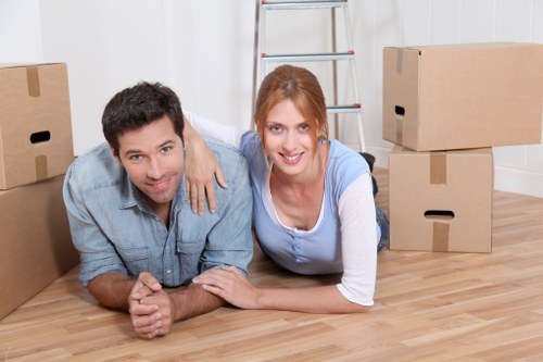 House removalists in London loading furniture into a moving van