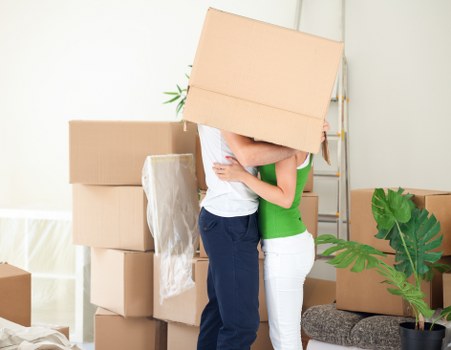 Organized moving boxes ready for a London relocation