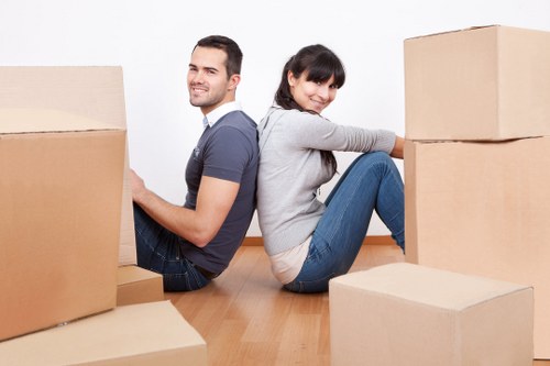 A professional removals team handling furniture in London