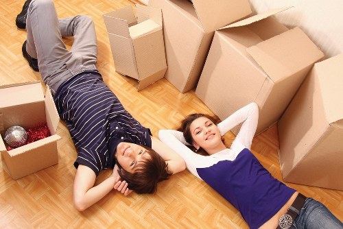 Office furniture and packed crates ready for a commercial move