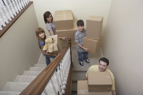Office relocation team packing equipment in London